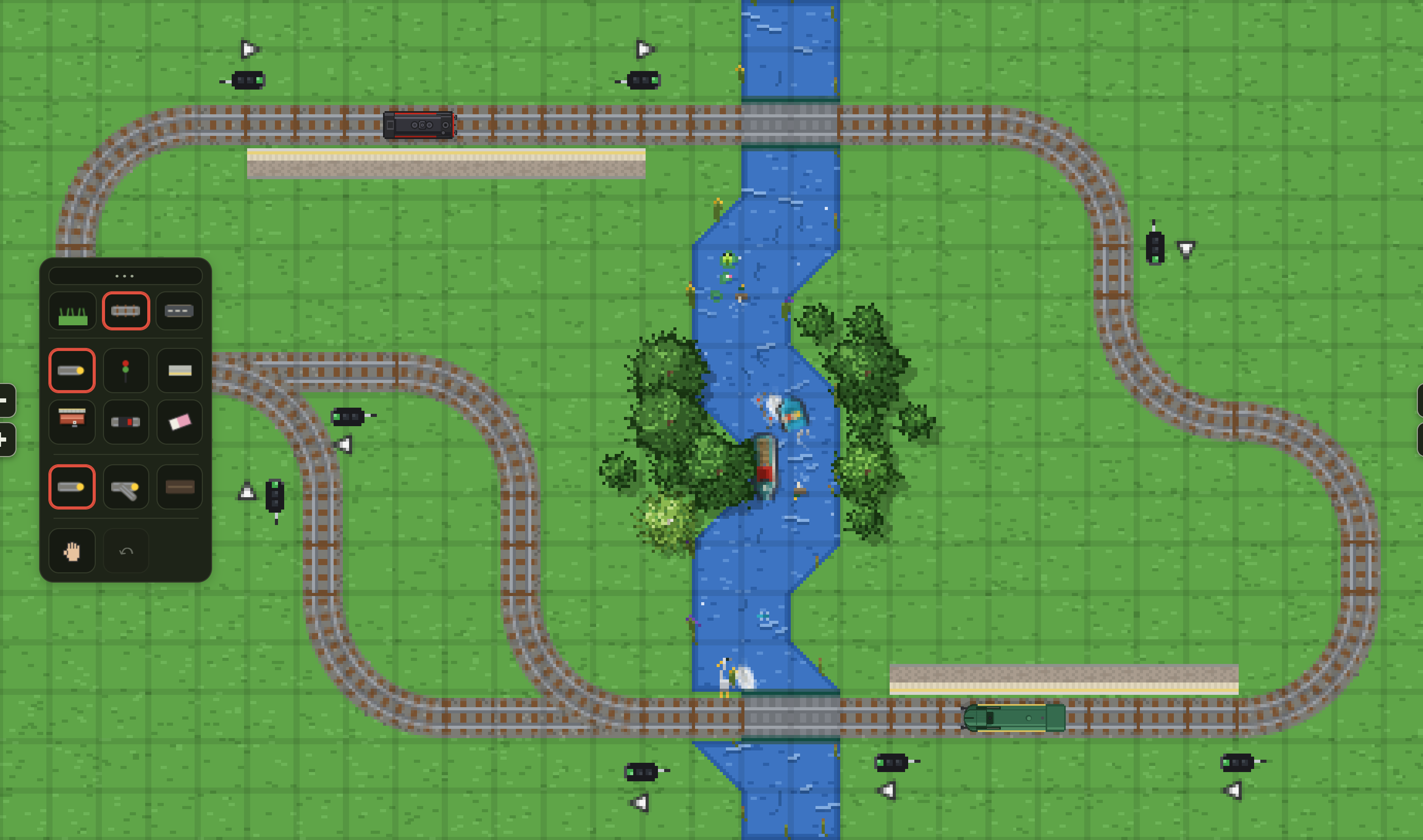 The same circuit in edit mode: a grid overlays the grass, the tool palette sits on the left, and ghost markers show where pieces would go.