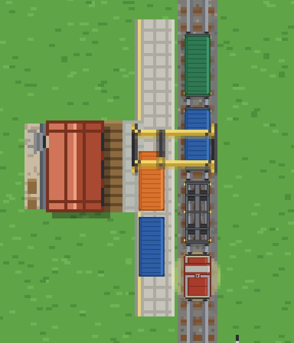 The red V 60 shunter at the freight dock with its container flats, the yellow gantry crane straddling a wagon beside the warehouse.